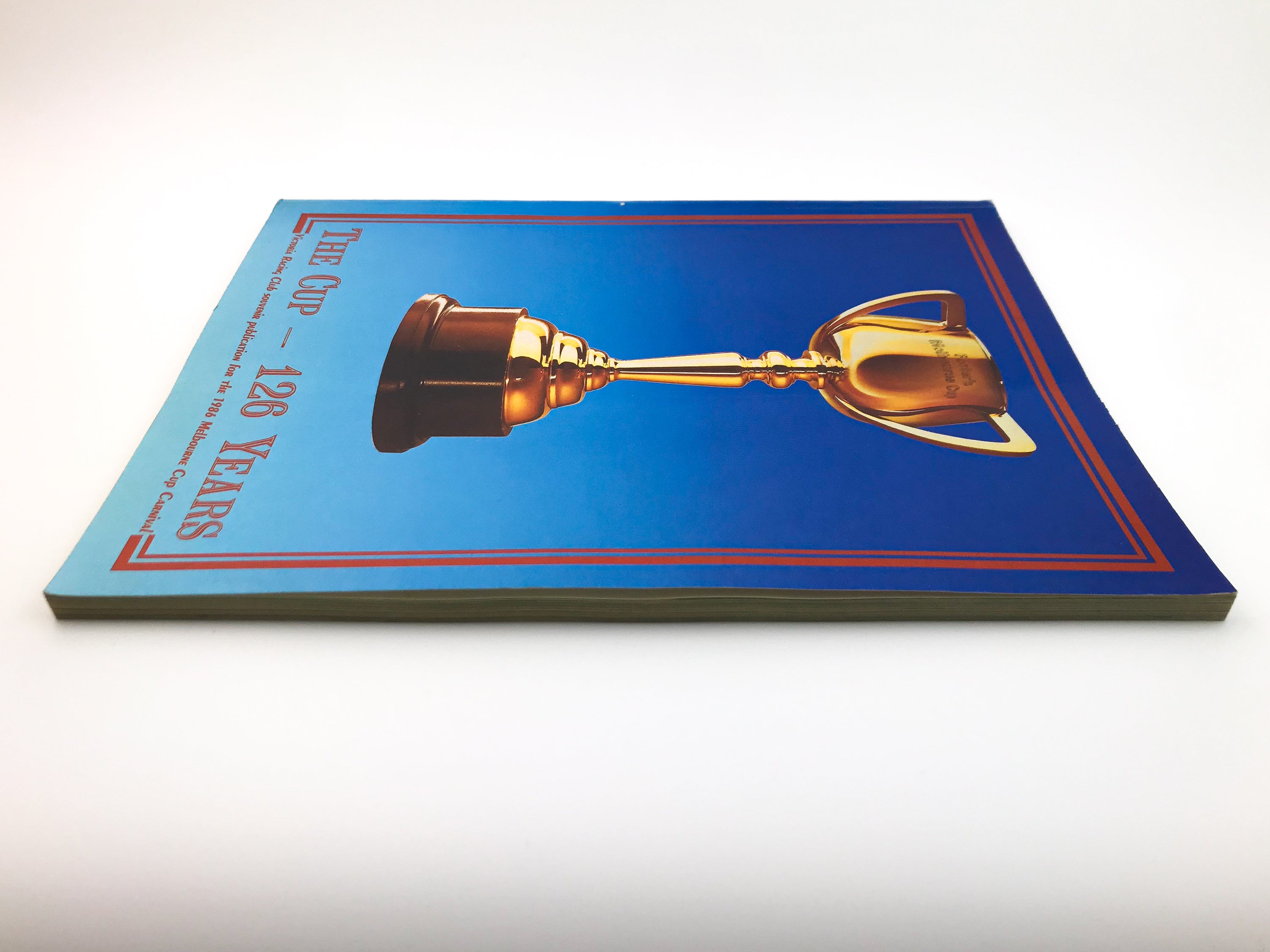 THE CUP — 126 YEARS: VICTORIA RACING CLUB MELBOURNE CUP CARNIVAL SOUVENIR [1986]